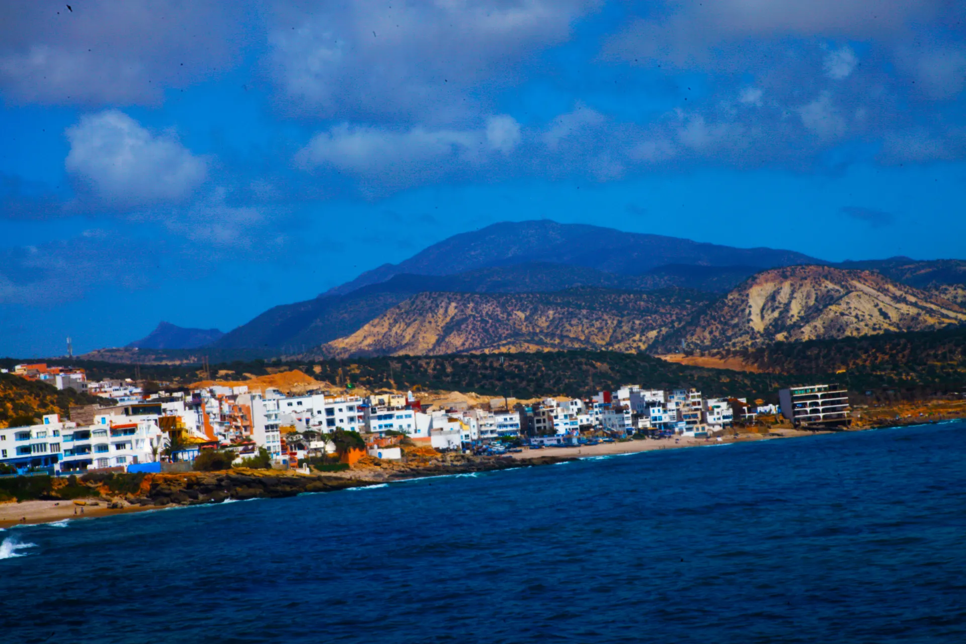 Taghazout bay seen from above — the Taghazout Bay resort zone where the Hyatt Regency sits occupies the southern part