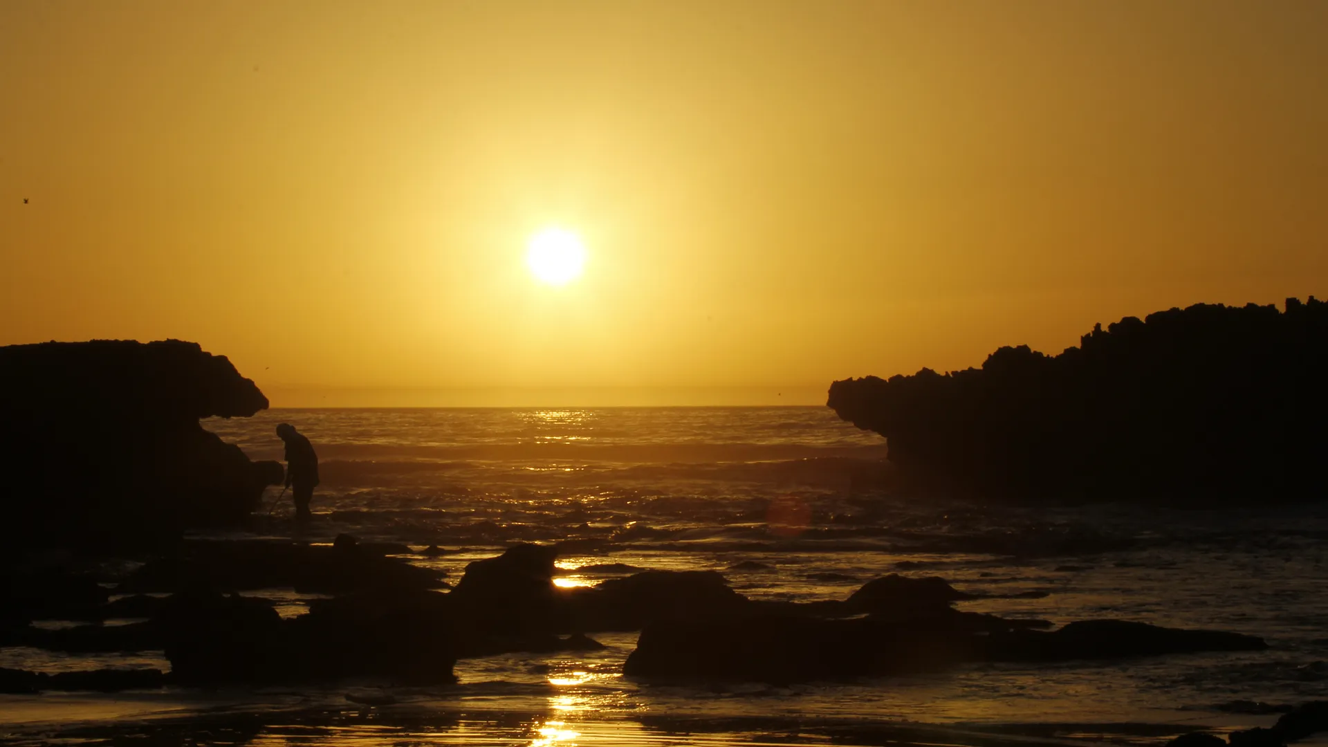 Sunset over the Taghazout coast — the Taghazout Bay zone where the Riu Palace Tikida sits is 5 km south of the historic village